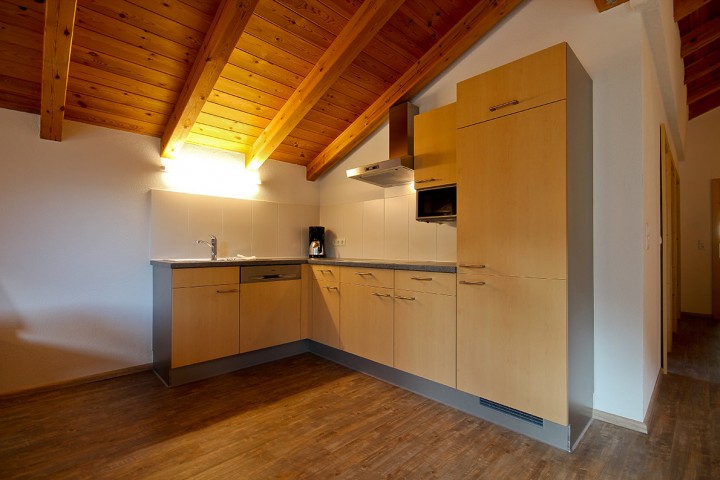 Fitted kitchen with dishwasher. Stove, microwave and coffee machine